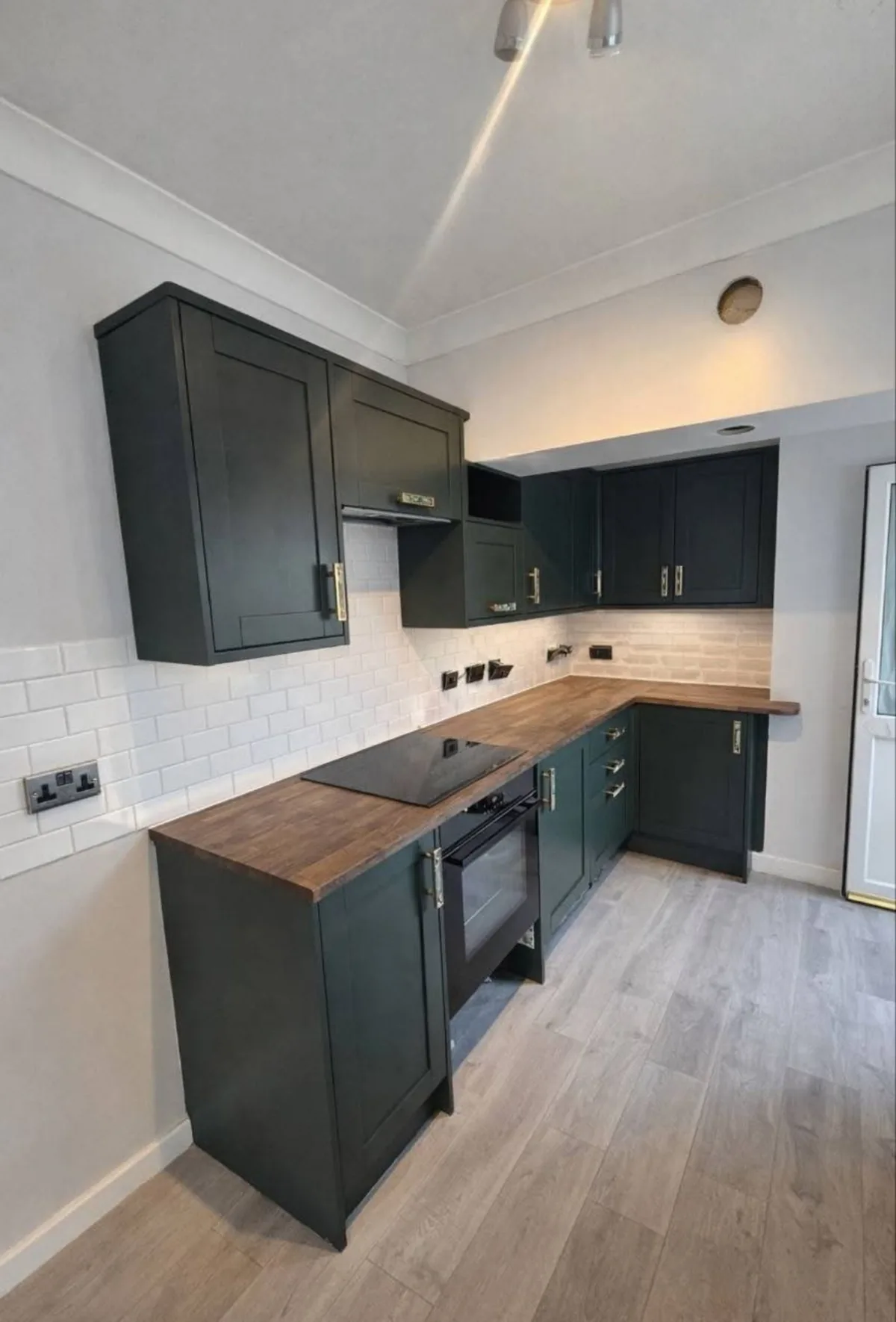 Small shaker kitchen resprayed charcoal with oak worktops